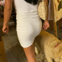 Beautiful brunette in white skirt