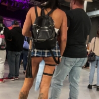 Mini skirt girl with butt plug