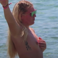 Couple of hot candid beach girls go topless for a photo shoot infs-7189-w.mp4-2024-01-28-08h28m26s055.jpg