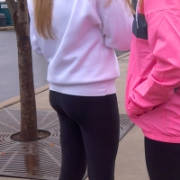 Cute college girl at a Temple game in black leggings College blonde at Temple game