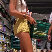 Candid hottie in yellow shorts showing cheeks and hard nips in a white top OC 57.mov-2023-01-29-05h29m42s223.jpg