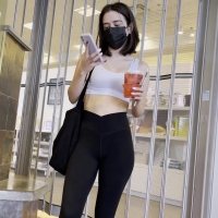 Brunette beauty in leggings