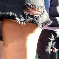Ass cheeks under skirt