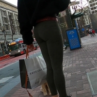 Dog walker in green leggings