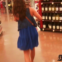 Girl in blue dress shopping