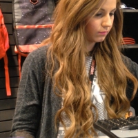 Pretty shoe store employee
