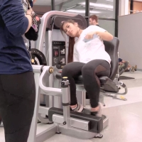 White girl and Asian working out