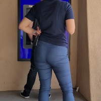 Latina at the atm