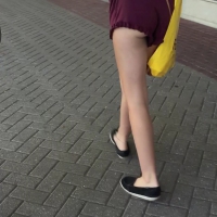 Skinny ass in short maroon shorts and thong