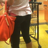 Hot brunette grocery shopping