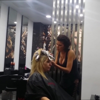 Big boobed hair stylist