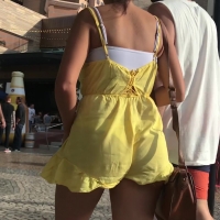 Girl in yellow romper