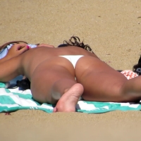 Three candid sexy beach girls laying out in bikinis together 3 TEEN.MOV.mov-2026-03-16-16h12m16s847.jpg