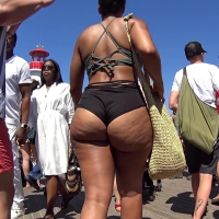 Candid sexy ebony babe with a big ass in a black bikini jiggling along the boardwalk (part 1) RC_87.m4v-2024-03-17-10h31m21s604.jpg