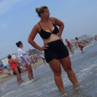 Big boobed milf on the beach with tan lines on her tits Big boobed milf tan lines
