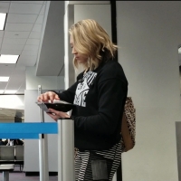 Blonde in striped leggings
