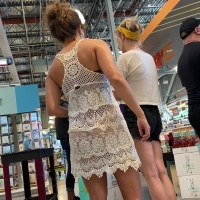 Showing her thong off