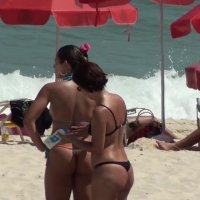 Three Brazilians in thongs