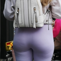 Blonde in purple leggings