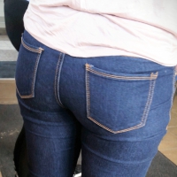 Brunette with a nice ass in tight jeans standing around and at atm Nice brunette ass in jeans