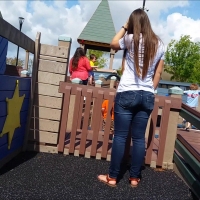 Cute babysitter in jeans