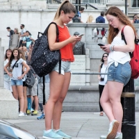 Bunch of candid babes in public in shorts 2297921@N20_32170960372_Mobile Girl.jpg