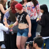 Bunch of candid babes in public in shorts 2968908@N22_8175378141_World Pride 2012 London.jpg