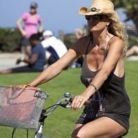 Bunch of candid babes in public in shorts 19953384@N00_7835569652_Cowgirl by the beach.jpg