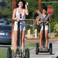 Bunch of candid babes in public in shorts 22909234@N04_8408106564_Segway 9_R.jpg