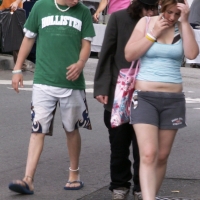 Bunch of candid babes in public in shorts 26733899@N00_2907145595_Slash and young friend ogling the rump of a woman on the phone.jpg