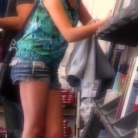 Bunch of candid babes in public in shorts 68843468@N04_6350052110_checking out the books.jpg