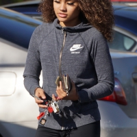 Beautiful black girl in Nike leggings in the parking lot Black babe in Nike leggings