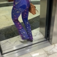Elevator girl in leggings