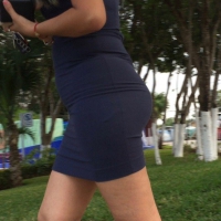 Thick and wide hipped Latina lady in a blue skirt Thick Latina lady in skirt