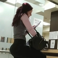 Girl standing around on the pho...