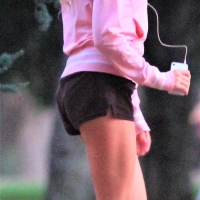 Beautiful skinny girl out for a walk in little shorts Beautiful skinny girl in shorts