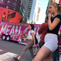 Beautiful teen tourist in shorts
