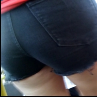 Latina girl in black denim shorts with a nice ass Girl in black shorts