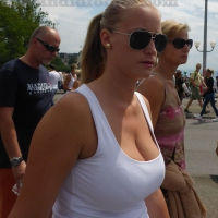 Blonde with big tits in tank top showing cleavage Blonde with big tits