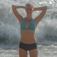 Blonde lady on the beach in bikini top and spandex shorts with a nice gap Blonde gap at the beach