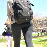 College brunette walking in leggings College brunette in leggings