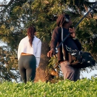 Vanessa Hudgens filming a sportswear ad in LA in tight green leggings 04.jpg