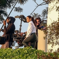 Vanessa Hudgens filming a sportswear ad in LA in tight green leggings 01.jpg