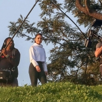 Vanessa Hudgens filming a sportswear ad in LA in tight green leggings 03.jpg