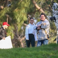 Vanessa Hudgens filming a sportswear ad in LA in tight green leggings 02.jpg
