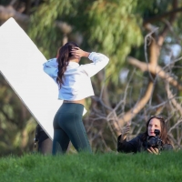 Vanessa Hudgens filming a sportswear ad in LA in tight green leggings 09.jpg