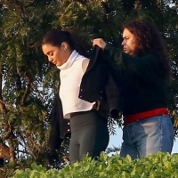 Vanessa Hudgens filming a sportswear ad in LA in tight green leggings 16.jpg