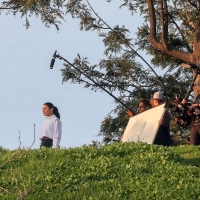 Vanessa Hudgens filming a sportswear ad in LA in tight green leggings 15.jpg
