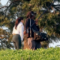 Vanessa Hudgens filming a sportswear ad in LA in tight green leggings 20.jpg