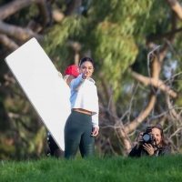 Vanessa Hudgens filming a sportswear ad in LA in tight green leggings 26.jpg